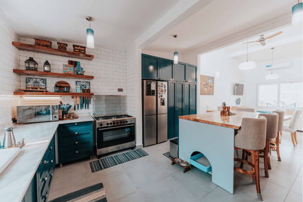 It is a drawing of a kitchen with a table and chairs.