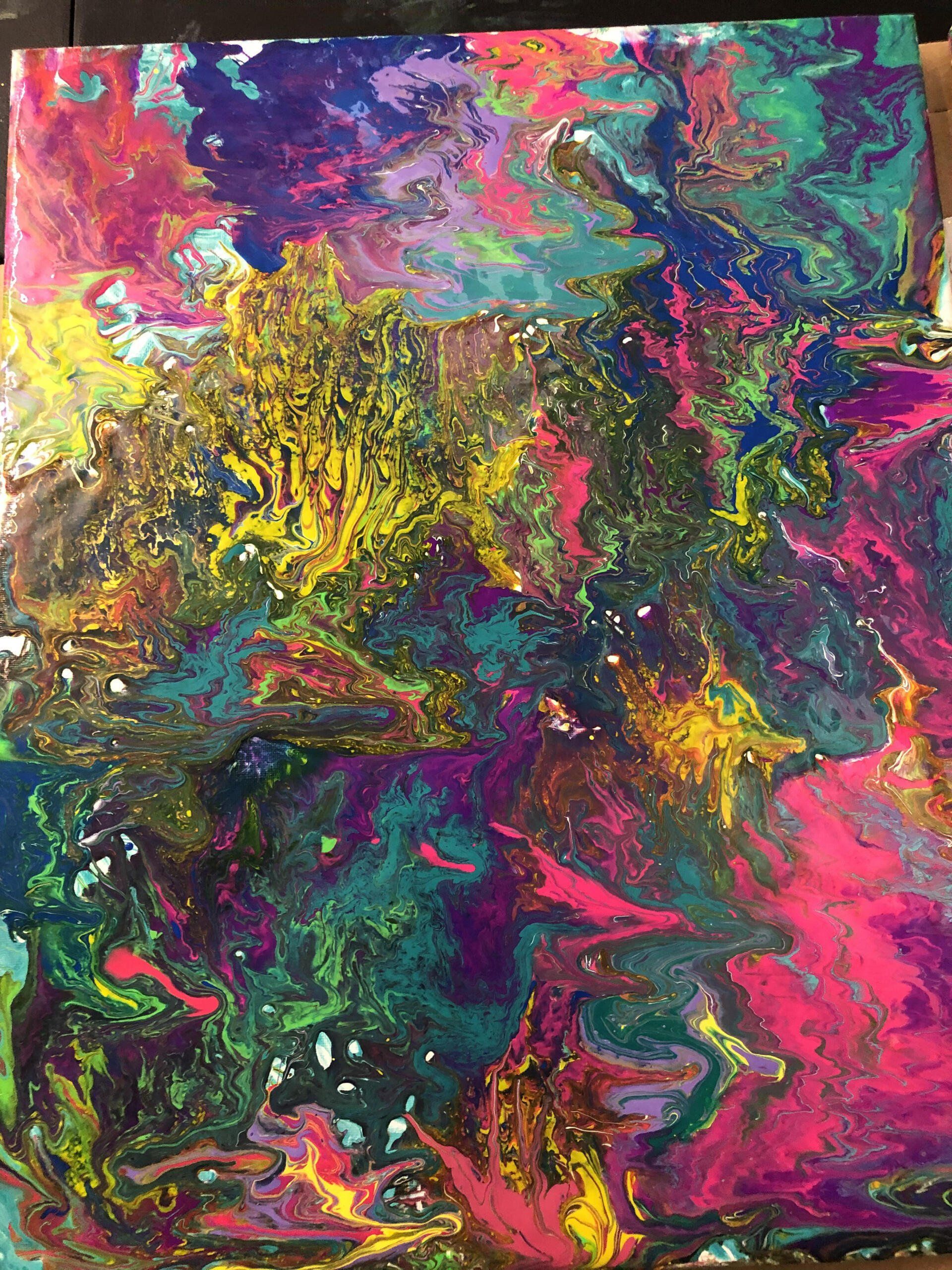A close up of a colorful painting on a canvas.