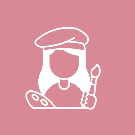 woman holding paint brush