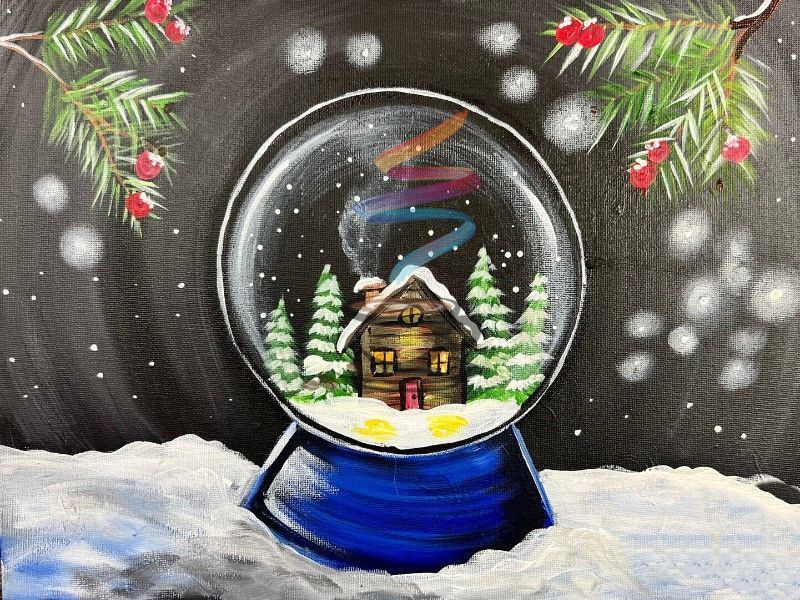 Snow globe with cabin scene and northern lights, on a snowy night with fir branches and red berries.