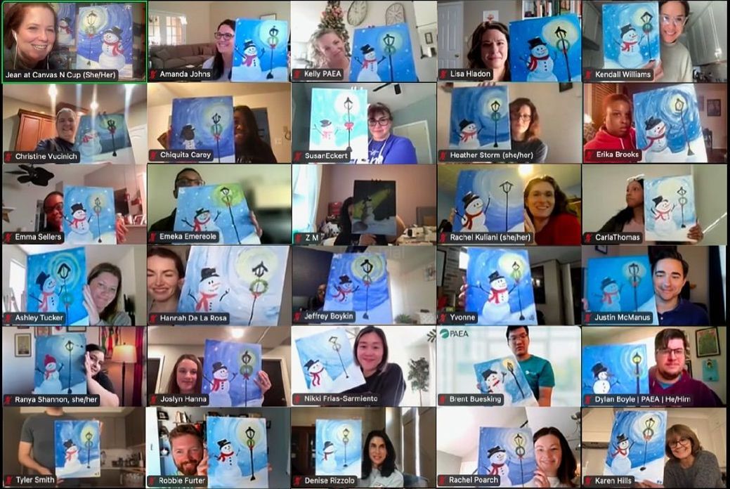 Group of people displaying paintings on a video call; snowman theme.