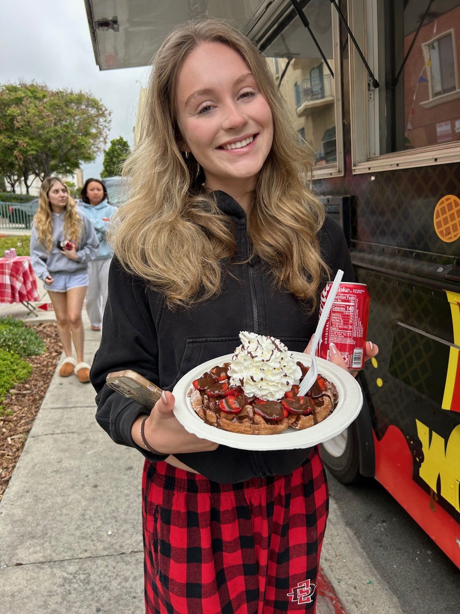 Hardy Avenue Apartments resident at community event near SDSU San Diego