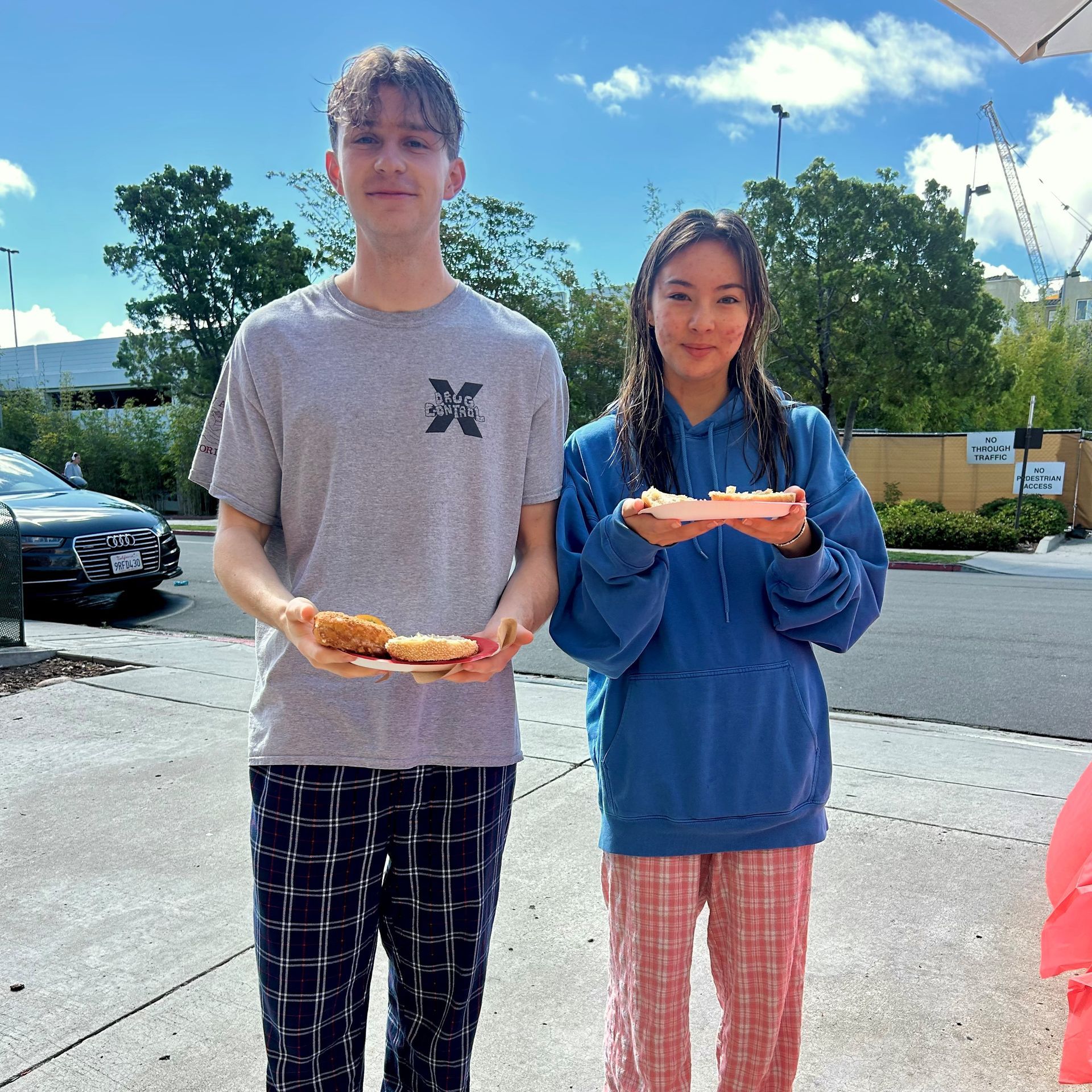Residents enjoying coffee and donuts at Hardy Apartments community event