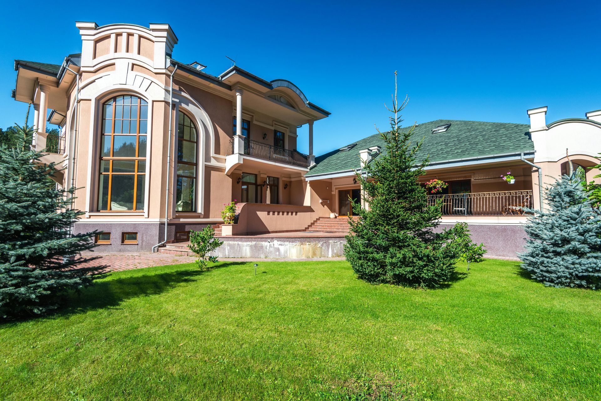 Beautiful home exterior with tinted windows showcasing improved privacy. - window films for privacy Beautiful home exterior with tinted windows showcasing improved privacy. - window films for privacy
