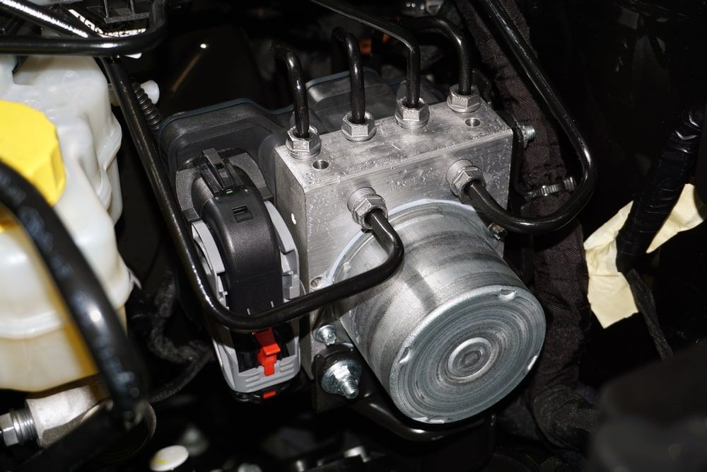 A Close Up Of A Brake System In A Car — Auto Elect In Parramatta Park, QLD