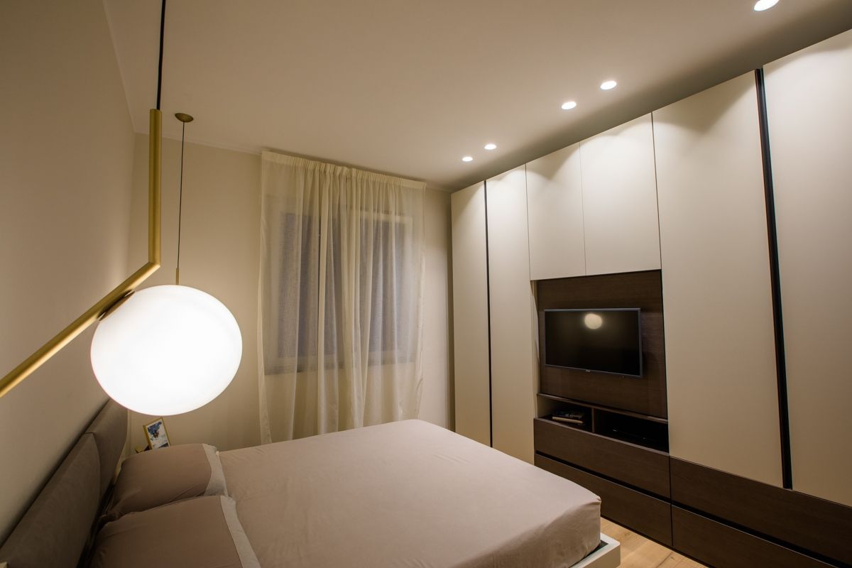 Appartamento Marina di Massa EFA Massa progettazione illuminazione camera matrimoniale