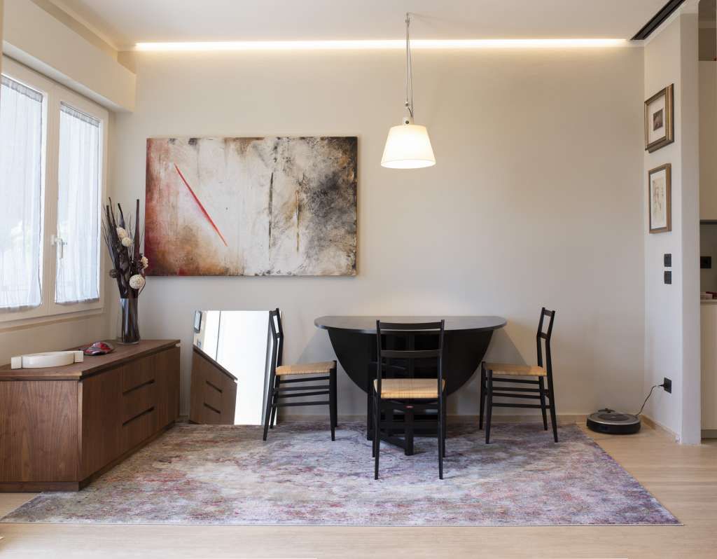 progettazione illuminazione living appartamento Pietrasanta EFA Massa