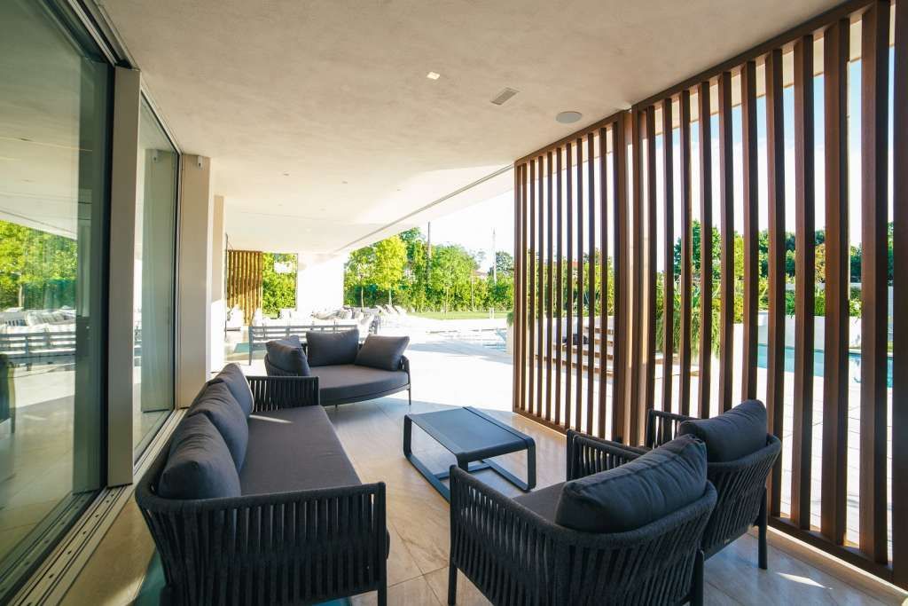 Glass House Forte dei Marmi veranda illuminotecnica EFA Massa