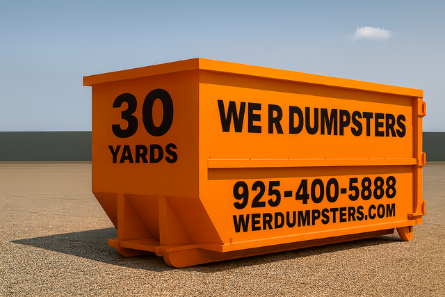 A bright orange 30-yard dumpster with
