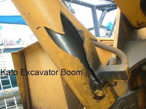Damaged Yellow Excavator Boom — Alloway Hydraulics in Mount Saint John, QLD
