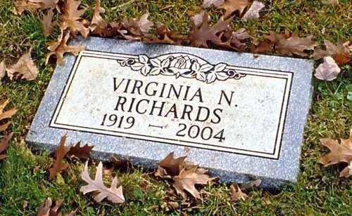 Gravestone for Virginia N. Richards, 1919–2004, surrounded by fallen autumn leaves.