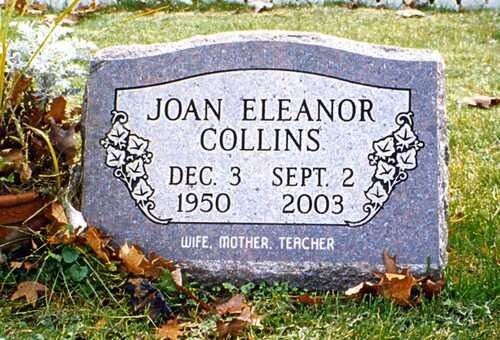 Gray gravestone with flowers, reading “Joan Eleanor Collins, Dec. 3, 1950 – Sept. 2, 2003”