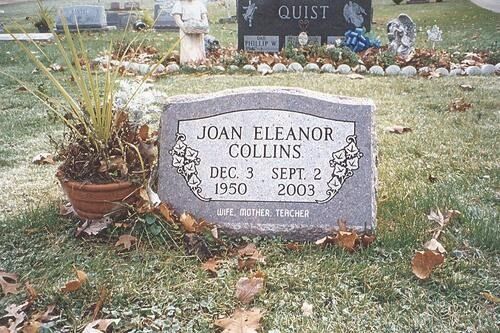 Gravestone reading “Joan Eleanor Collins,” with flowers and fall leaves in a cemetery.