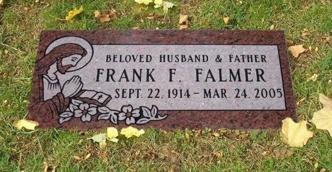 Gravestone for Frank F. Palmer in a grassy cemetery, with floral engraving and dates Sept. 22, 1914–Mar. 24, 2005.
