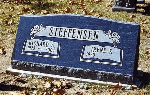 Blue gravestone for the Steffensen family with names Richard A. and Irene K. engraved on plaques.