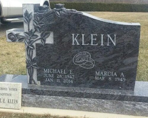 Klein family gravestone with engraved names and dates in a cemetery