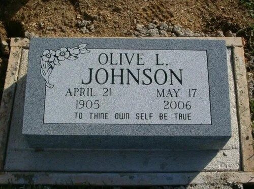 Gray gravestone for Olive J. Johnson with floral carving and the inscription “To thine own self be true.”