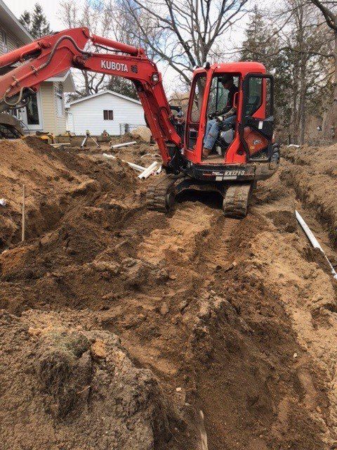 Excavator Digging - Flushing, MI - Don’s Septic Services