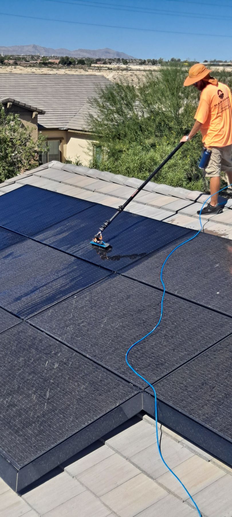 Cleaning dirty solar panels with water-fed poles in Henderson and Las Vegas, NV
