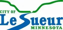 City of Le Sueur, Minnesota logo with green and blue text and a blue river design