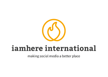 logo: iamhere international