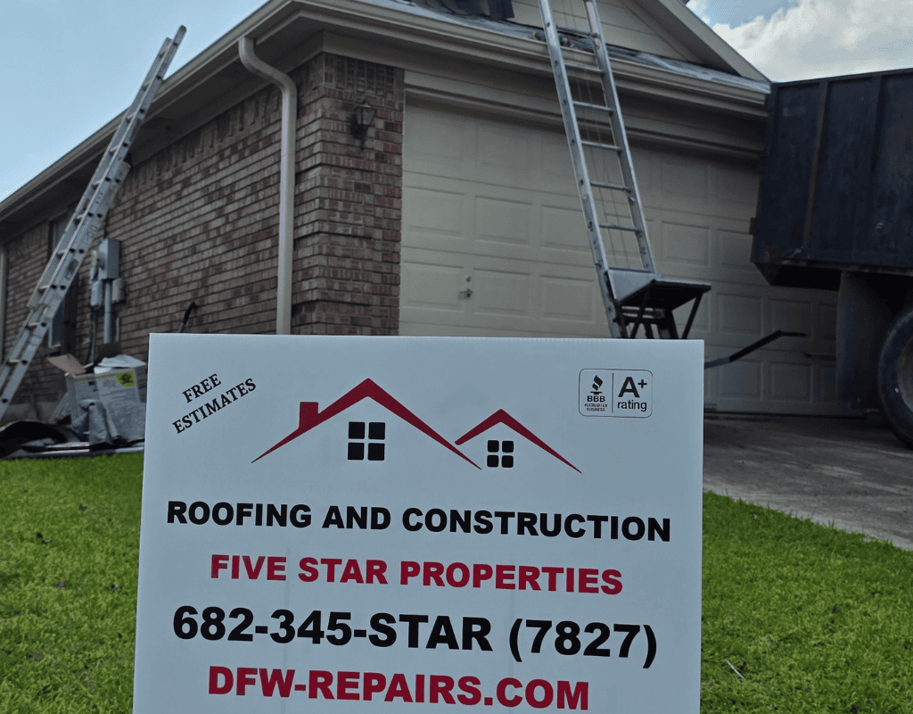 Roofing company sign in front of a brick house and driveway
