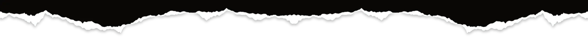 A pattern of rounded shapes in a black and white image.