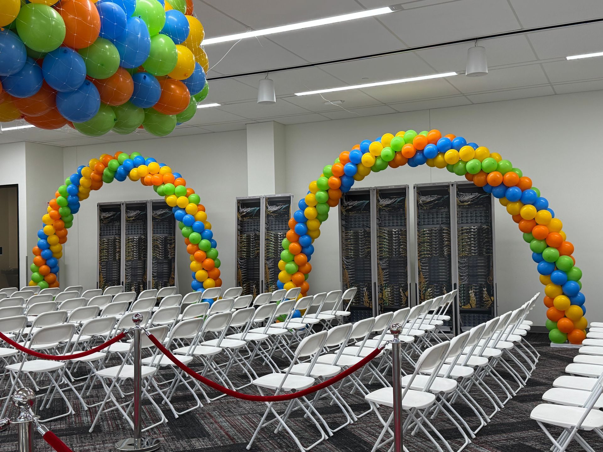 Large rainbow balloon arches for school and corporate events in South Atlanta, Georgia