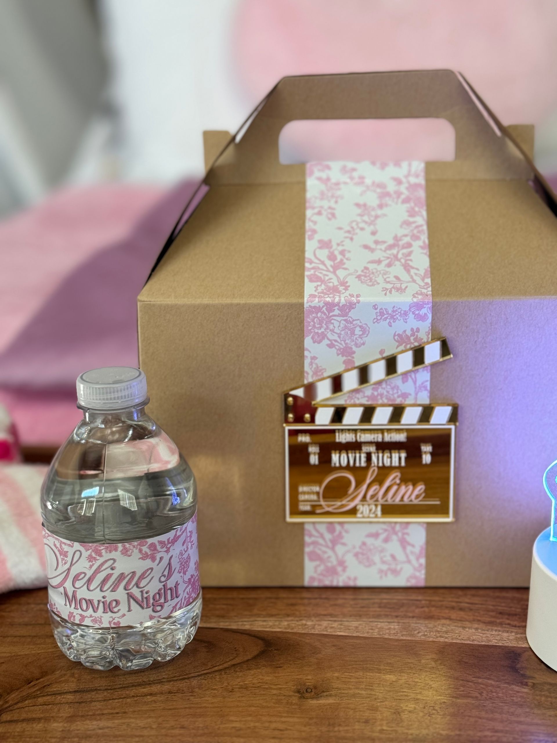 Custom party favor box with pink decorative ribbon for children’s event