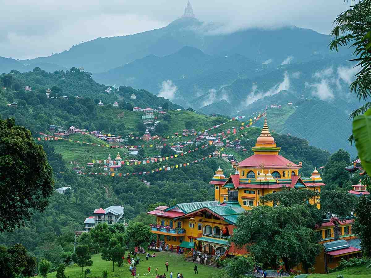 Colorful Buddhist monastery on a misty green hillside with distant mountain peaks