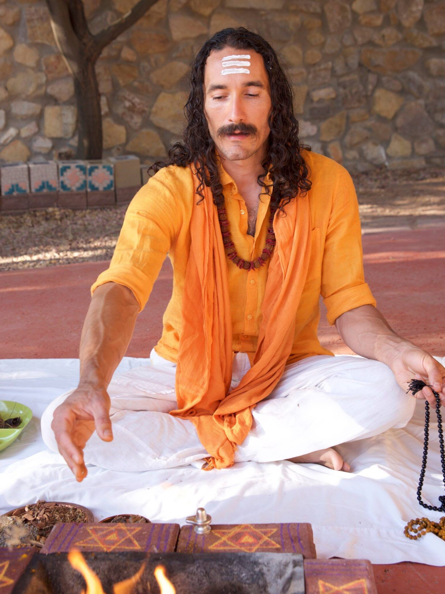 Two people embracing during spiritual counseling at Enlightened Life Temple