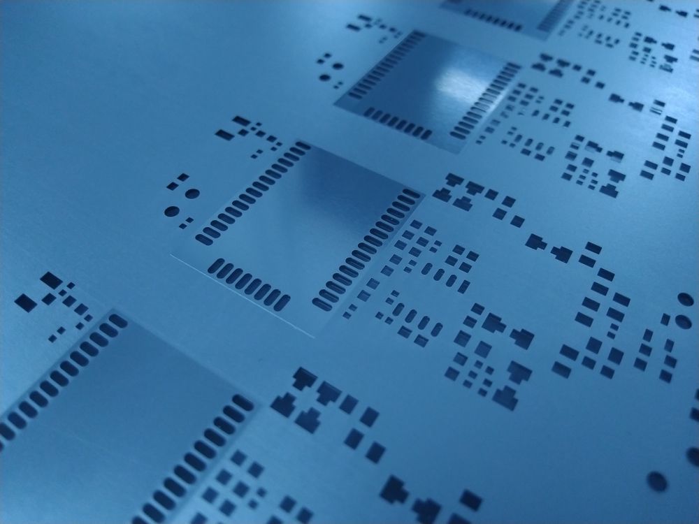  Opening Stencil of metal mask for solder paste component PCB. blurred background