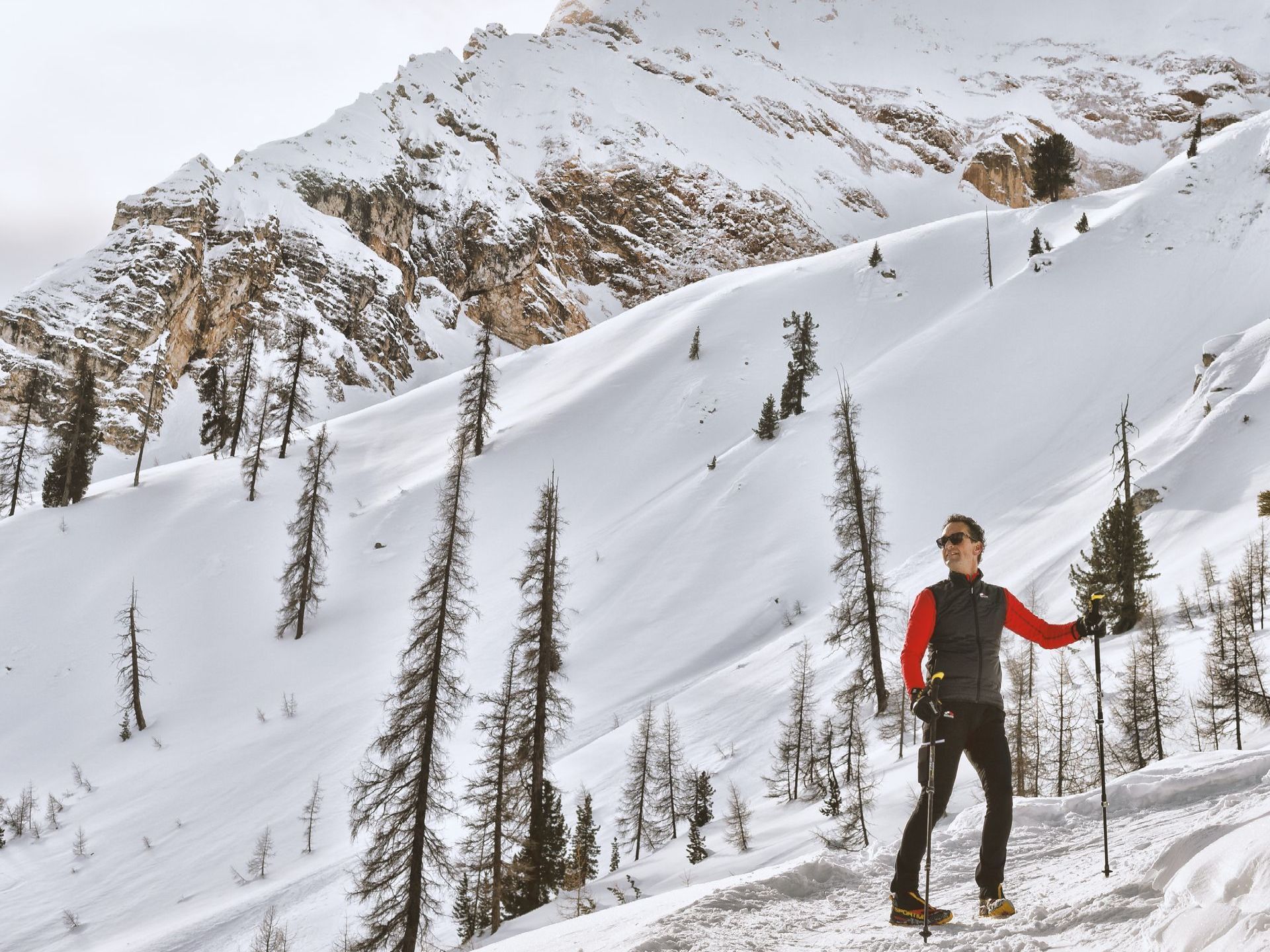 man standing on a snow covered mountain