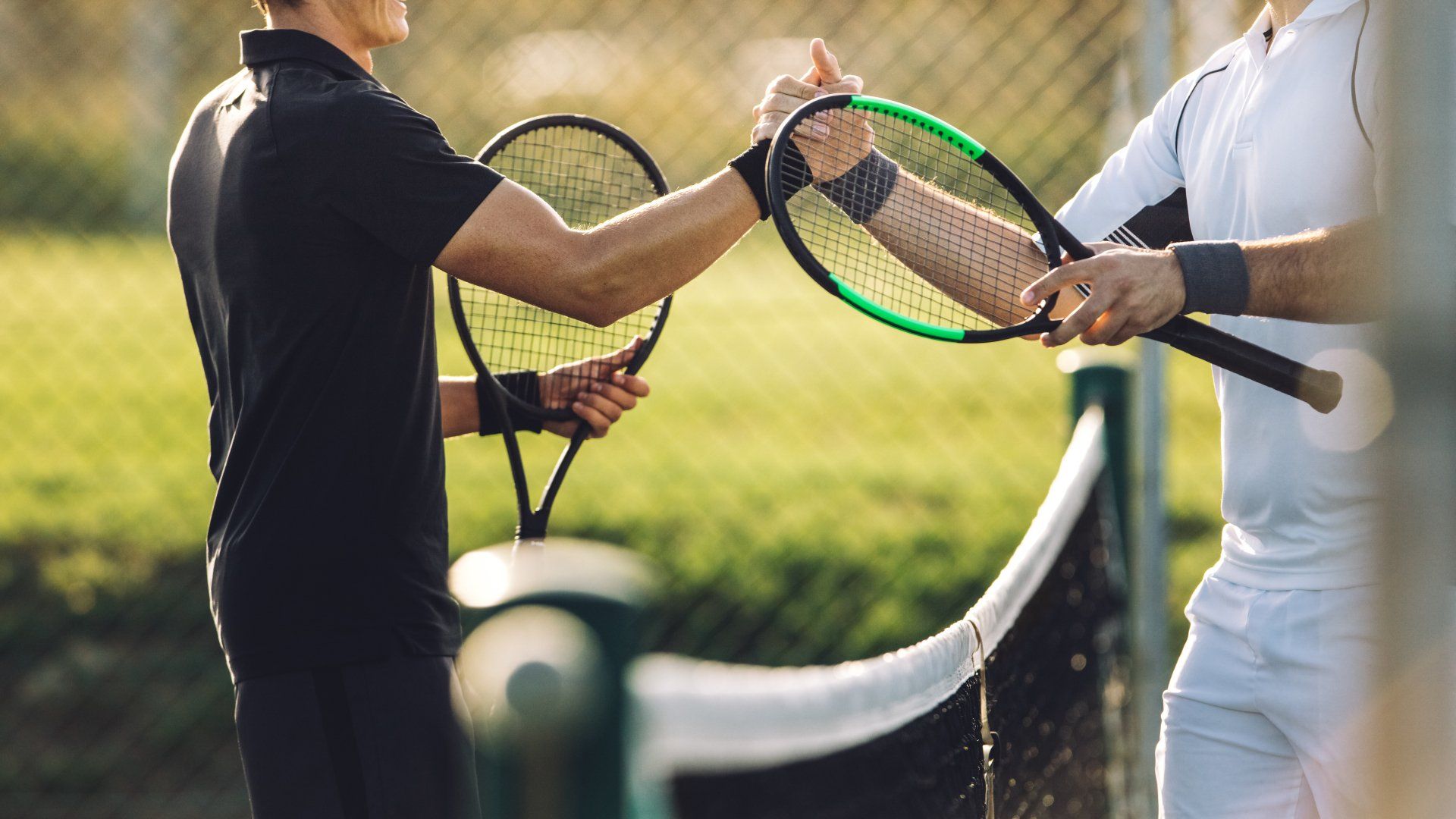 Two tennis players congratulating each other.