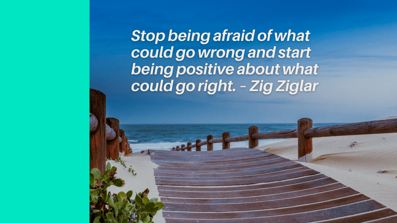 A wooden walkway leading to the ocean with a quote by Zig Ziglar