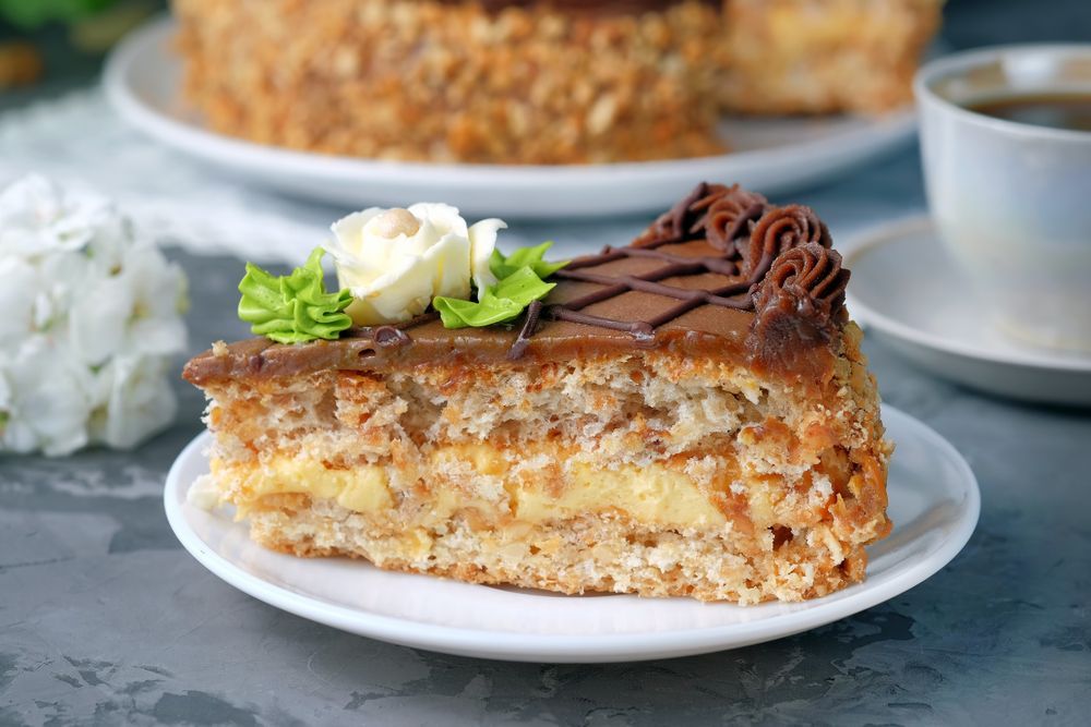 A Slice of Cake is on a White Plate — Mumbo's Pizza'n'Pasta In Lismore, NSW