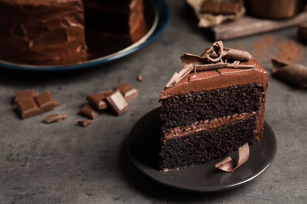 There is a Slice of Chocolate Cake on a Plate — Mumbo's Pizza'n'Pasta In Lismore, NSW