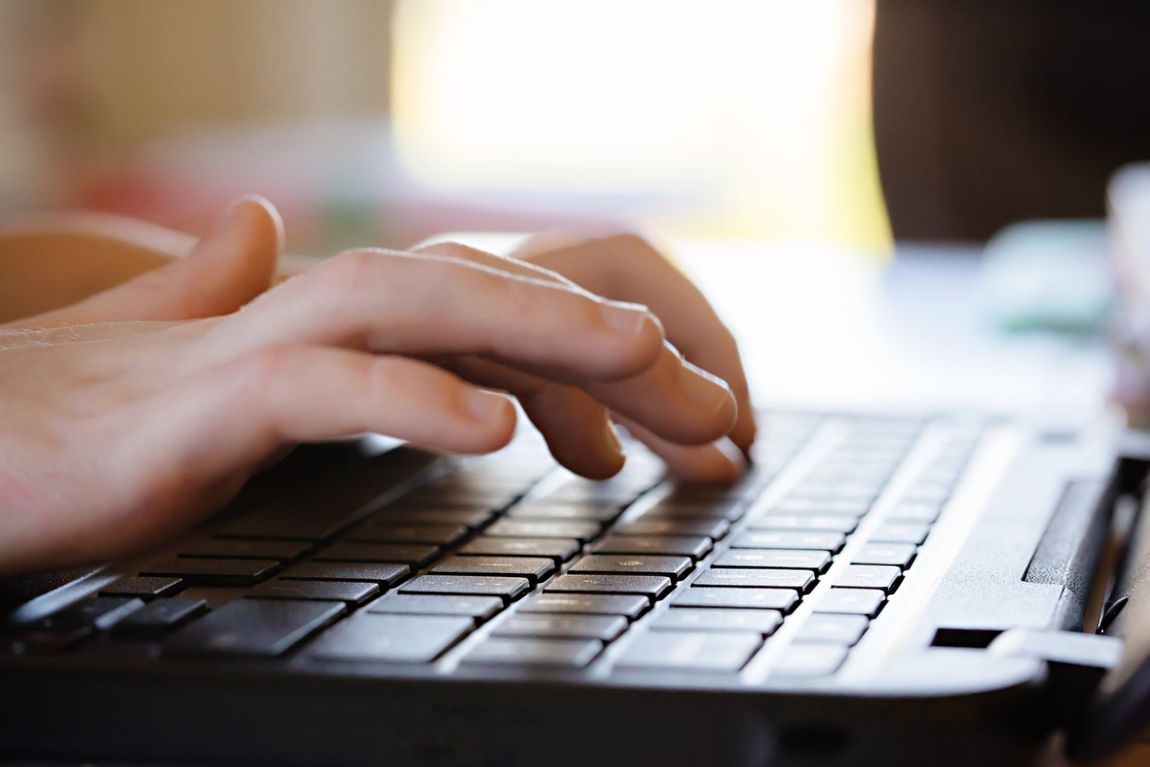 Typing in Laptop — Rochester, NY — Call The Computer Wizard