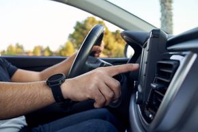 Side View Shot Inside a Car of a Man — Central Islip, NY — Defensive Driving School Side View Shot Inside a Car of a Man — Central Islip, NY — Defensive Driving School