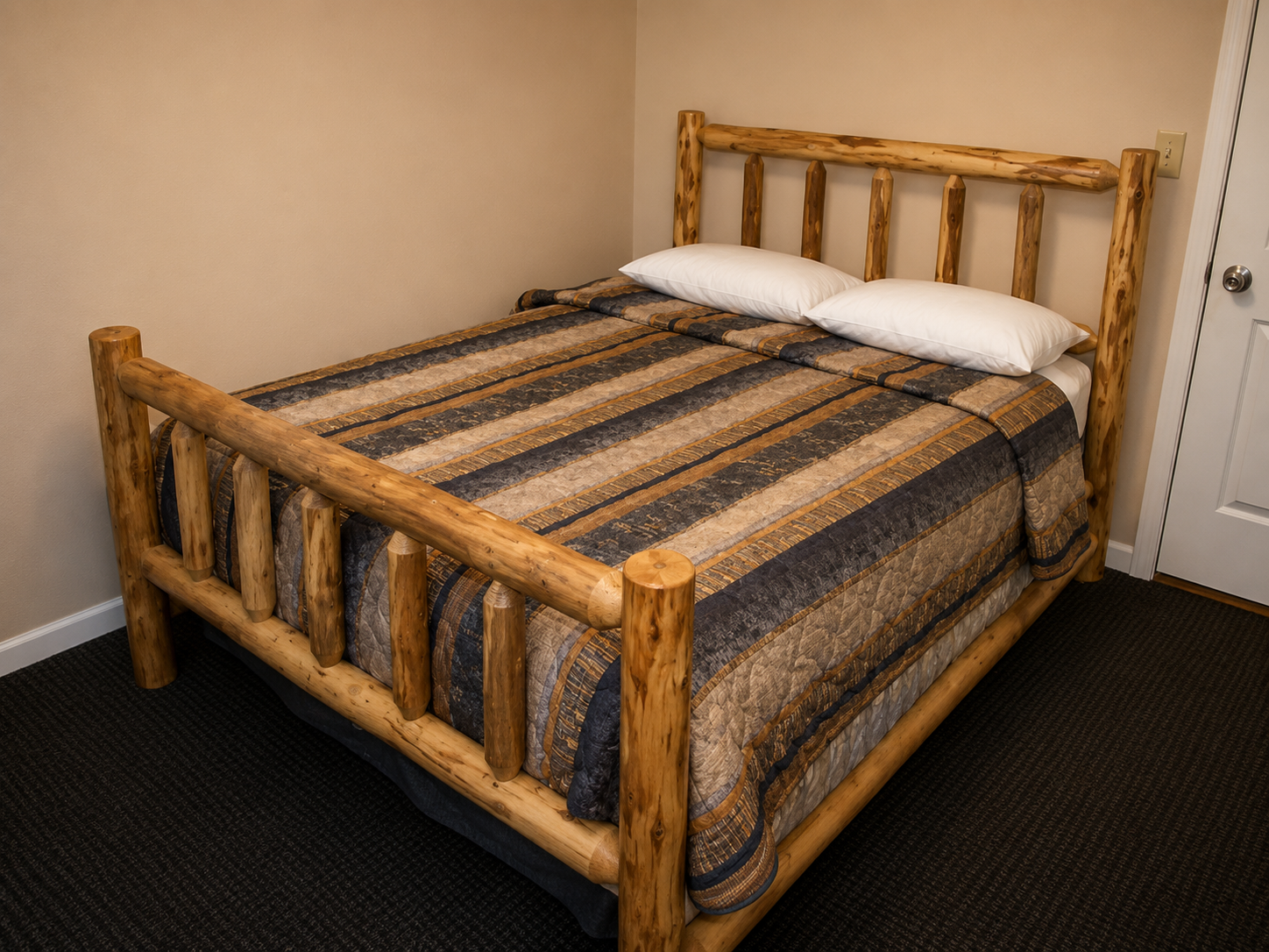 Rustic wooden log bed with striped comforter and white pillows in a small beige bedroom