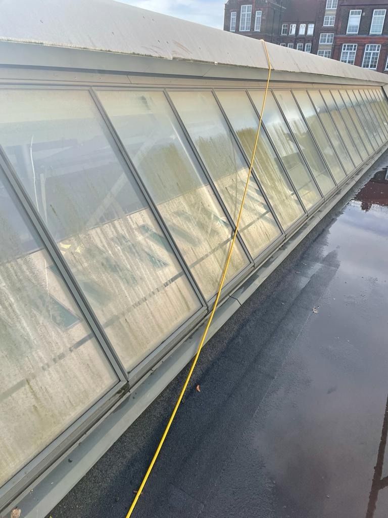 Dirty Angled glass roof in Croydon area