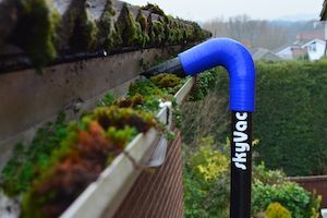 Residential gutter cleaning with sky vac