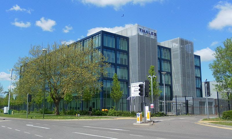 Modern blue and silver office building with 