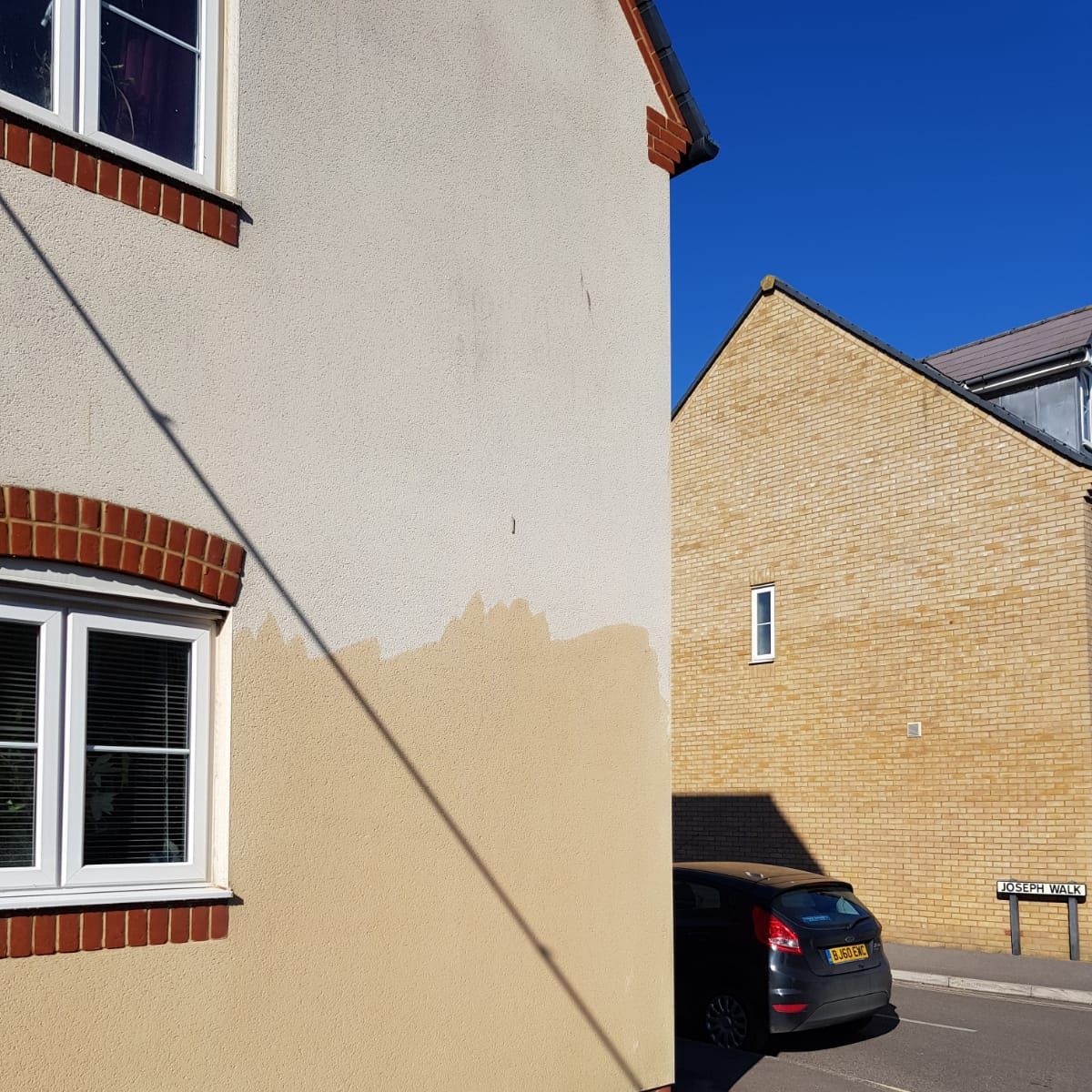 Render cleaning Brighton residential property before soft wash treatment