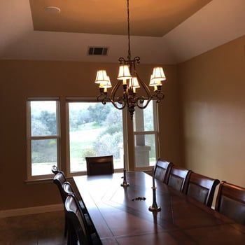 Dining Room With Long Wooden Table