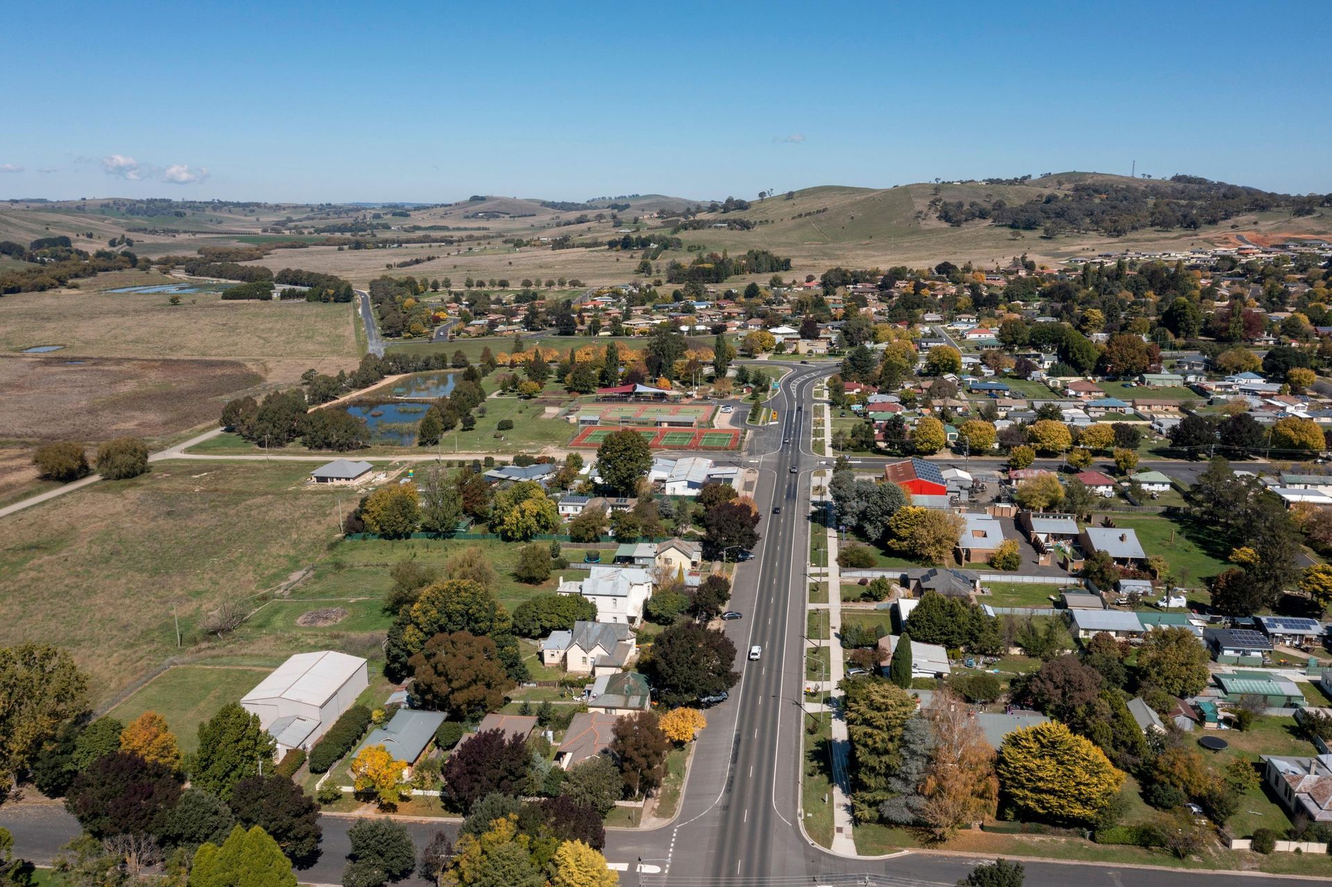 Aerial View of a Small Town Surrounded by Trees and Fields — JP Civilworx Pty Ltd in Singleton, NSW