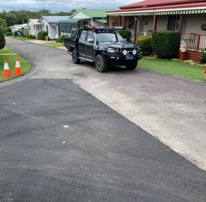 Black Truck is Parked on the Side of the Road — JP Civilworx Pty Ltd in Port Stephens, NSW