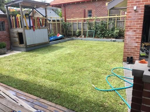 There is a Hose in the Middle of the Grass in the Backyard — JP Civilworx Pty Ltd in Wyong, NSW
