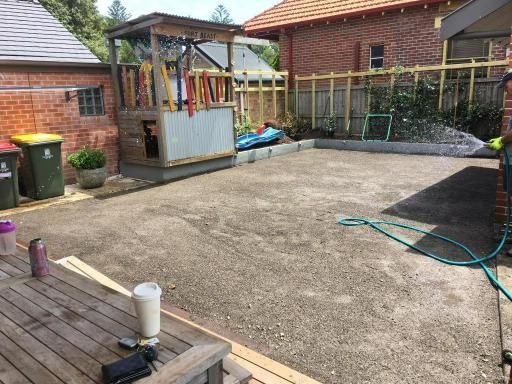 Hose is Connected to a Wooden Table in a Backyard — JP Civilworx Pty Ltd in Muswellbrook, NSW