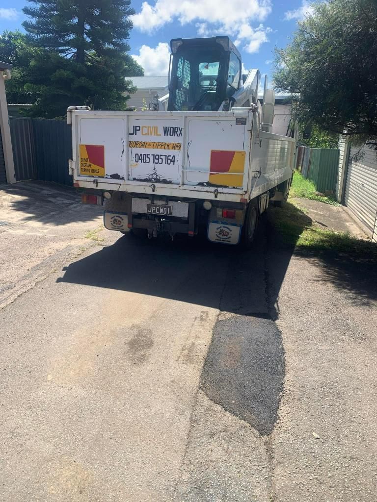White Truck is Parked on the Side of the Road — JP Civilworx Pty Ltd in Cessnock, NSW